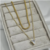 Colar corrente larga + triangulo zic ouro - comprar online