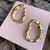 BRINCO OVAL ORGANICO