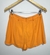 Shorts Saia Manacá Laranja na internet
