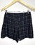 Shorts Saia Xadrez Preto na internet