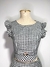 Conjunto Cropped e Saia Xadrez na internet