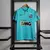 Camisa polo do time Santos FC na cor azul, com logo da Nike e patrocinadores.
