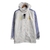 Jaqueta Corta-Vento Real Madrid 21/22 - Masculina Adidas - Branca com detalhes em azul e amarelo