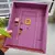Imagem do Porta-Chaves Friends – A Icônica Porta Roxa na Tua Casa!
