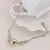Pulseira com Pomo de Ouro – Um Toque Mágico no Seu Estilo! - Geeek