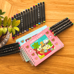 Kit 2 Livros de colorir Comfy and Cozy + 24 Canetinhas na internet
