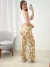 Calça pantalona Duna estampada 40135 na internet