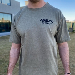 Remera "SMILE" verde militar en internet