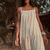 Vestido listrado fluído longo