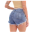 Model wearing stylish and comfortable women's denim shorts, showcasing a distressed design and frayed hem.