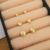 Brinco Trio Fixo Coração Liso c/ Zirconia Central