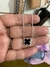 Pulsera con medallita negra