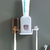 Dispenser Aplicador Creme Dental Suporte 4 Escovas Banheiro Parede Multifuncional - comprar online