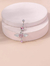 Piercing de ombligo rosa con alas