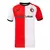 Camisa masculina do Feyenoord, nas cores branca e vermelha, com logotipo da Castore e do MediaMarkt.