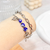 Pulsera doble ojitos mariposa - comprar online