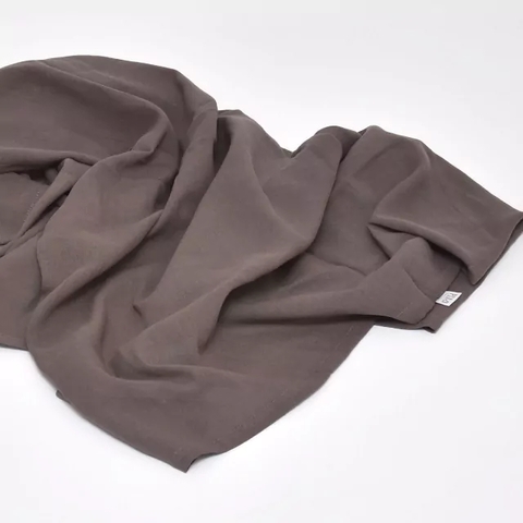 Manta recibidora de muselina visón