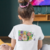 Camiseta Jardim Colorido - Infantil 100% Algodão Preta na internet