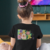 Camiseta Jardim Colorido - Infantil 100% Algodão Preta na internet