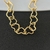 Choker coração vazado banhada a ouro 18k na internet