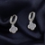 Argola Trevo de Luxo Cravejada - comprar online