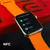 Smartwatch WS25 Mini 42mm com tela de 1.52” exibindo notificações de aplicativos de pagamento como WeChat, AliPay e PayPal, com pulseira laranja.