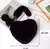Cartera corazón peluche en internet