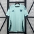 Camisa de treino do Cruzeiro 25/26, na cor azul clara, com logo e detalhes em verde escuro.