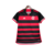 Camiseta de futebol do time Flamengo, com listras horizontais vermelhas e pretas, detalhes em branco e logo do clube.