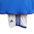 Kit infantil azul do Cruzeiro com detalhes em branco, incluindo a camiseta e o short, da marca Adidas.
