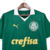 Camisa de futebol do Palmeiras, na cor verde, com detalhes em branco e logo da Puma.