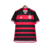 Camisa do Flamengo I 24/25, modelo torcedor da Adidas, nas cores preta e vermelha, com listras horizontais e logo do clube.