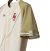 Camisa feminina do Vasco da Gama III 24/25, na cor bege, com detalhes em dourado e o escudo do time em vermelho.
