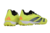 Chuteira Society Adidas Predator 24 Elite Low Unissex nas cores amarelo e preto, mostrando o design moderno e a sola com cravos.