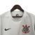 Camisa branca do Corinthians 24/25, com logo do clube e detalhe em preto da marca Nike.