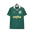 Camisa de futebol verde do Palmeiras com detalhes em branco e logo da Puma