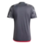 Camisa Flamengo III 24/25 masculina, cor cinza, vista traseira com detalhes em preto e vermelho.