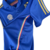 Camisa retrô azul do Palmeiras com detalhes em dourado e listras nas cores da bandeira italiana.