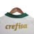 Detalhe do verso do kit infantil Palmeiras II 24/25 da Puma, destacando a gola verde e a inscrição "crefisa" em dourado.