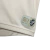 Detalhe da camisa feminina do Vasco da Gama III 24/25, destacando o patch comemorativo de 100 anos do clube.