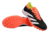 Chuteira Society Adidas Predator 24 Elite, com cabedal preto e detalhes em branco e laranja.