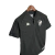 Camisa preta feminina do Vasco da Gama III 24/25, da marca Kappa, pendurada em um cabide.