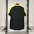 Camisa de treino do Atlético Mineiro, modelo 25/26, na cor preta com detalhes em amarelo e laranja, fabricada pela Adidas.