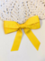 Laço de fita amarelo - comprar online