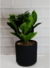 Planta artificial decorativa con maceta de cerámica