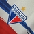 Camisa-branca-do-Fortaleza-Esporte-Clube-24/25-com-detalhes-em-azul-e-vermelho-para-torcedores-masculinos.