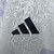 Imagem do CAMISA MANCHESTER UNITED 25/26 AWAY II - TORCEDOR ADIDAS - BRANCO - ROXO