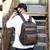 Mochila de carregamento USB de couro PU para homens, mochilas grandes para lapto