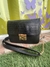 Cartera mini negra con cadena