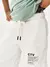 Conjunto infantil blusa verde e bermuda off white Catavento - comprar online